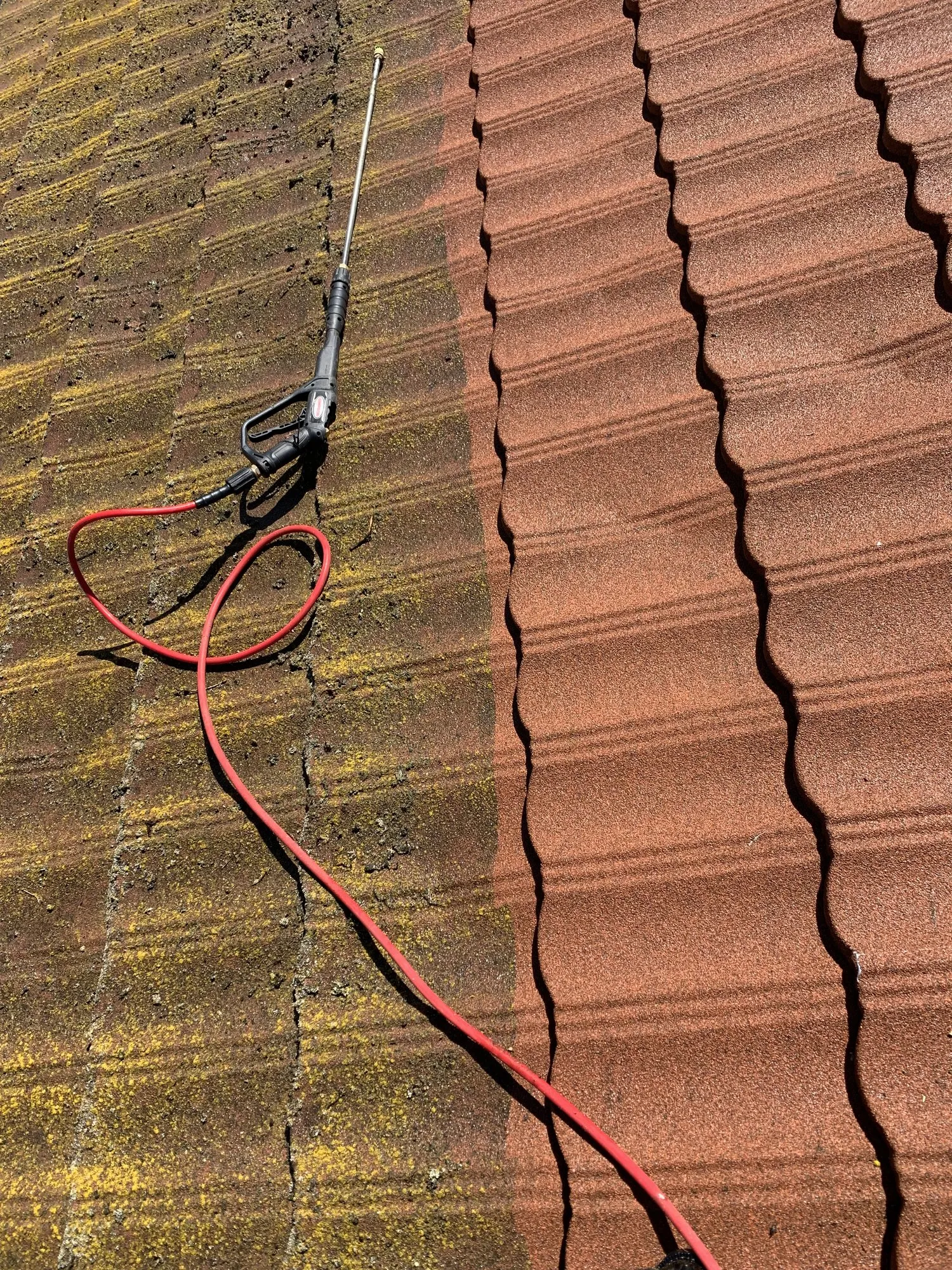 Half cleaned tile roof
